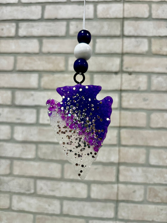 Purple arrow head